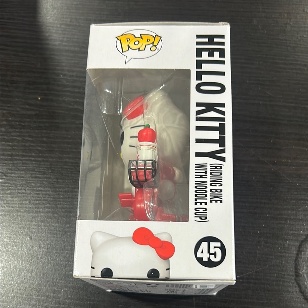 Hello Kitty Riding Bike Vinyl Figure - Picture 2 of 4